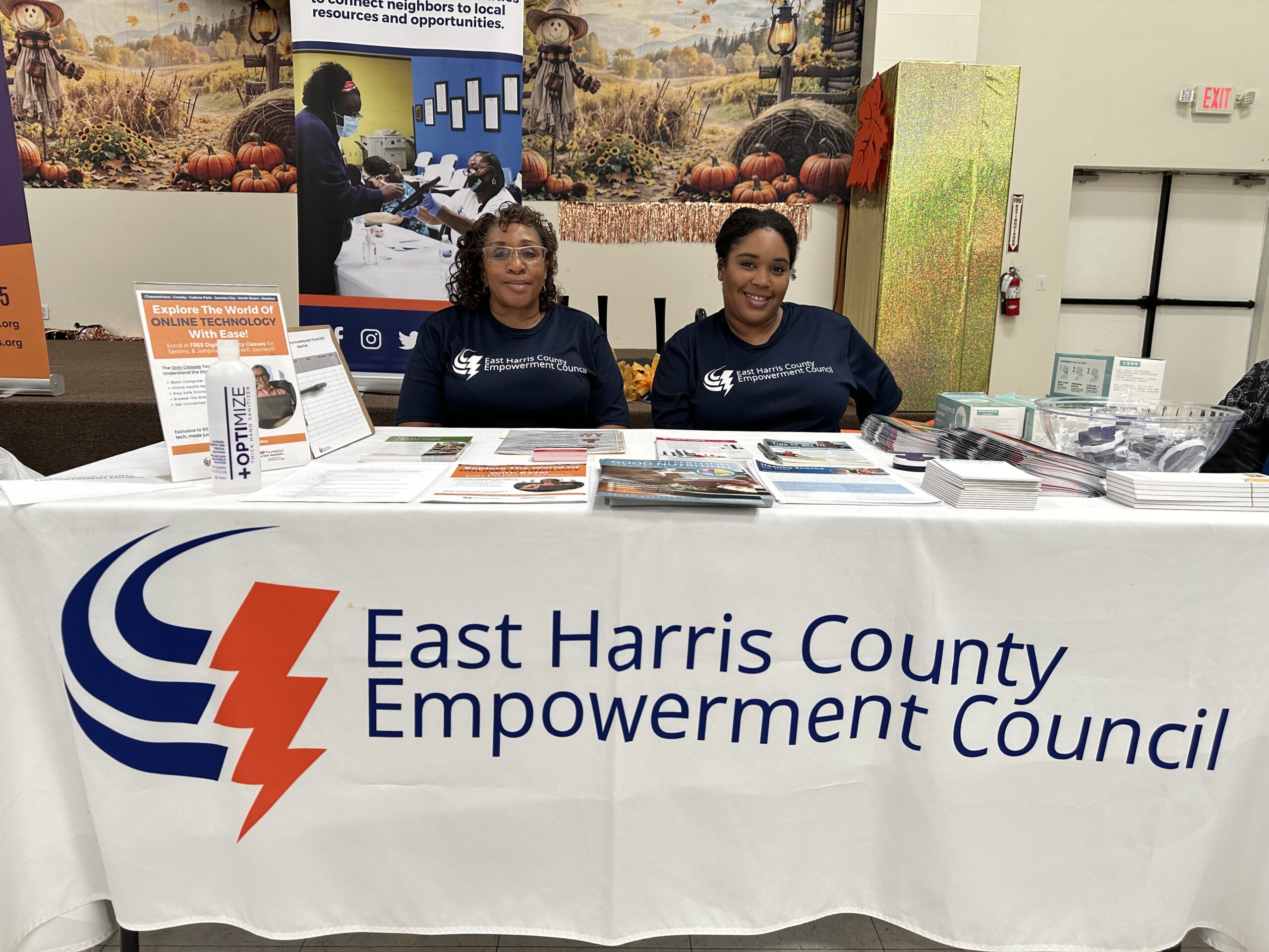EHCEC colleagues connecting with neighbors at a community resource table