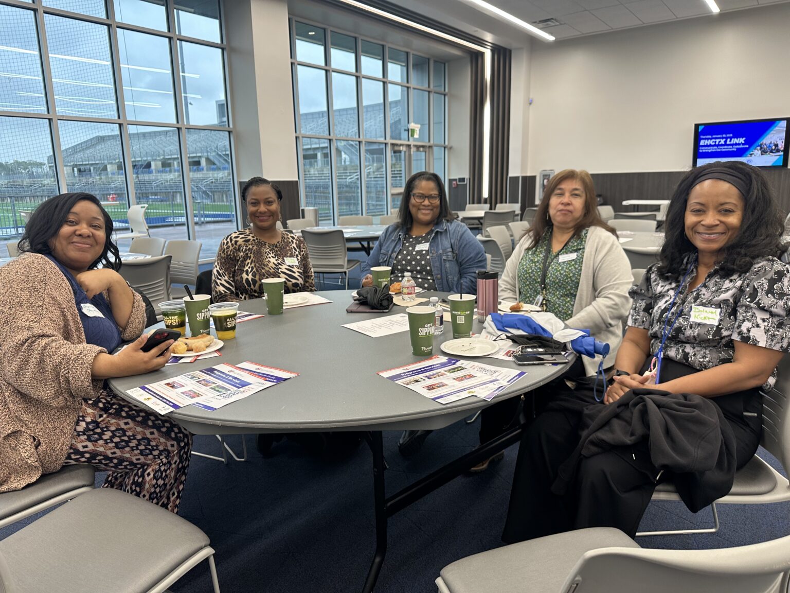 Community members connecting around a table